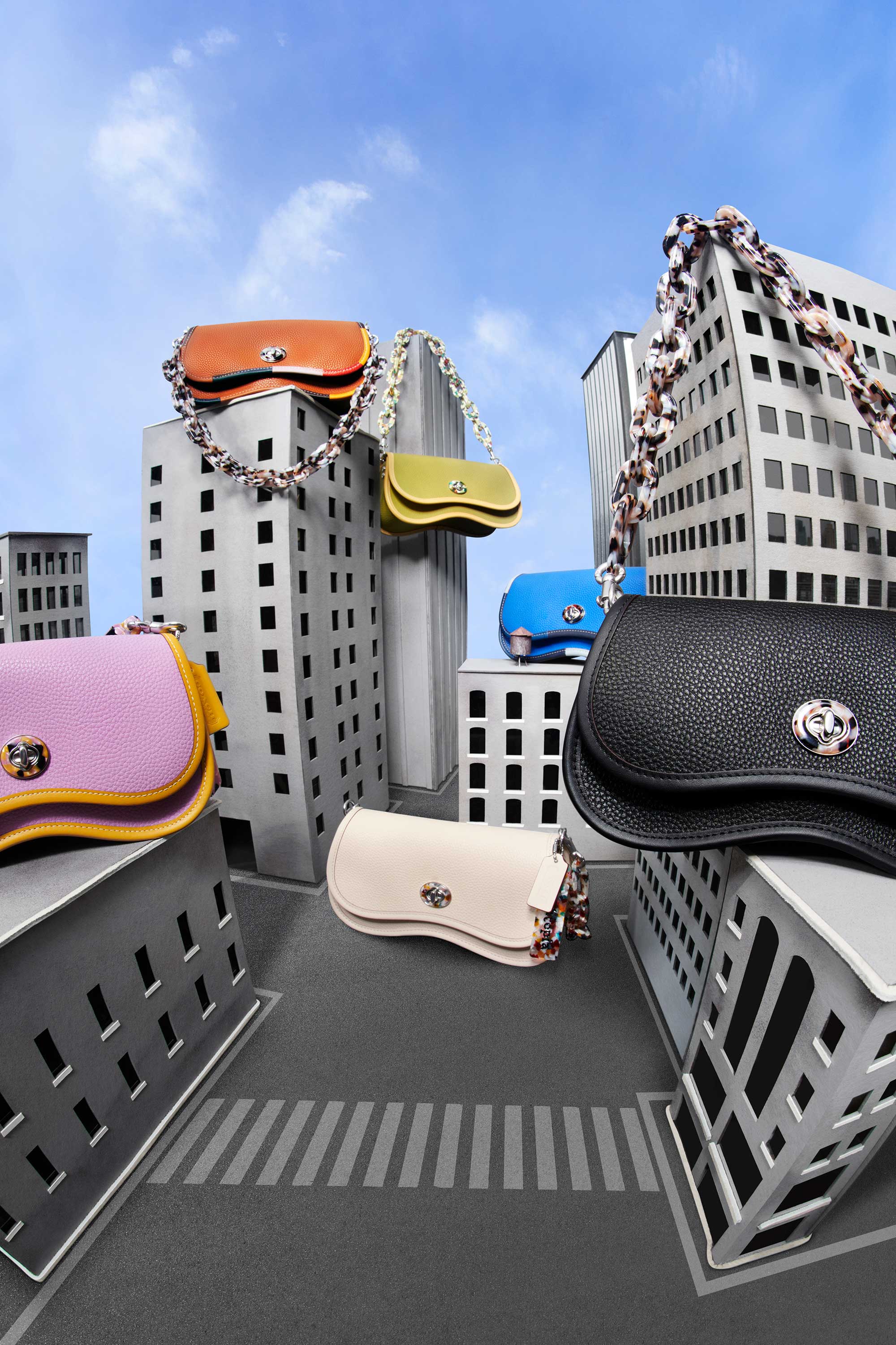 Giant purses scattered throughout city.