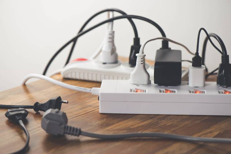Multiple plugs in power strips.