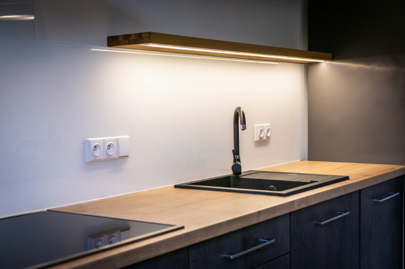 Modern kitchen with LED light over sink