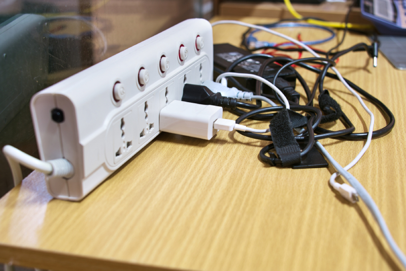 Power strip with multiple plugs connected