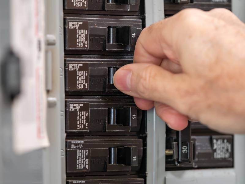 Hand adjusting circuit breaker.