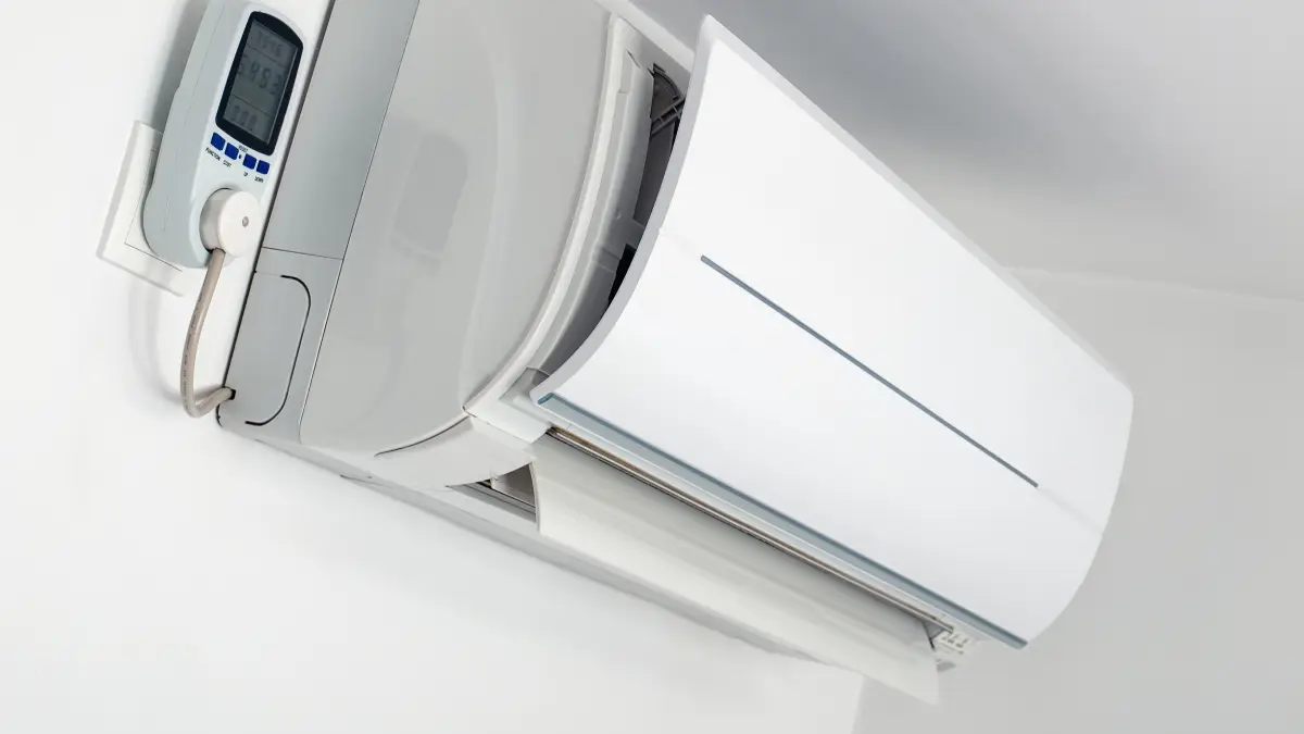 Wall-mounted ductless mini-split AC unit