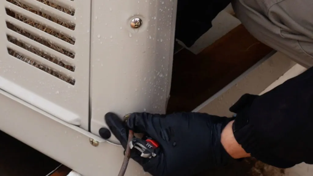 Technician fixing evaporative cooler in Albuquerque.
