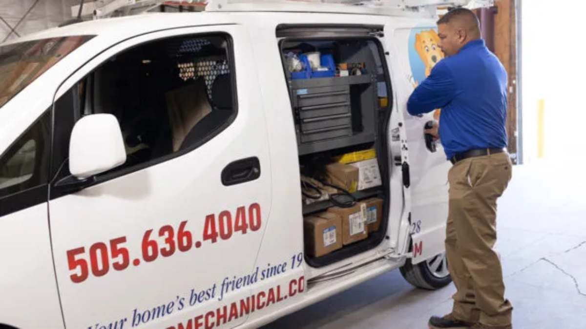 Technician prepares equipment at service van.