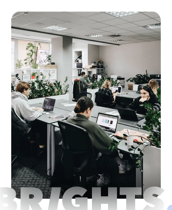 A vibrant office space with employees working at desks 