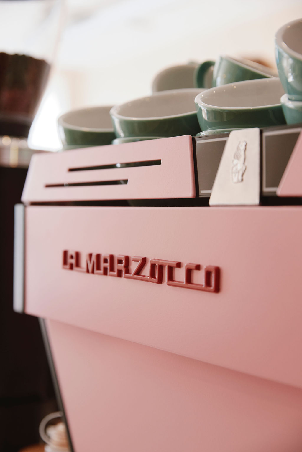 Pink La Marzocco espresso machine at the Drop-in Wandsworth caf&eacute;