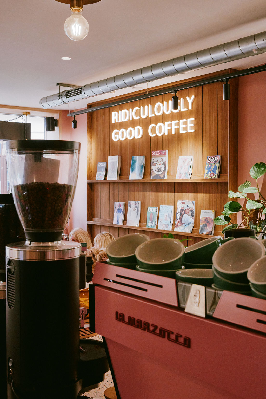 The pink La Marzocco coffee machine at the Drop-in Richmond café