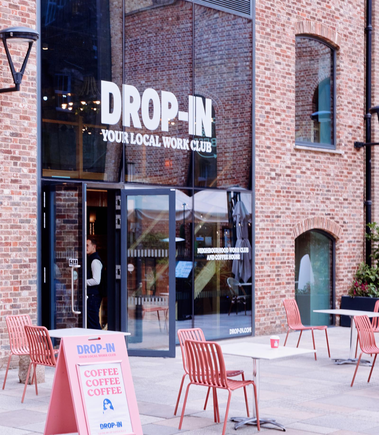The Drop-in Wandsworth entrance in Ram Quarter, caf&eacute; tables out front, SW18