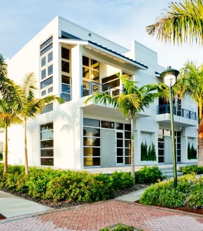 a building with palm trees