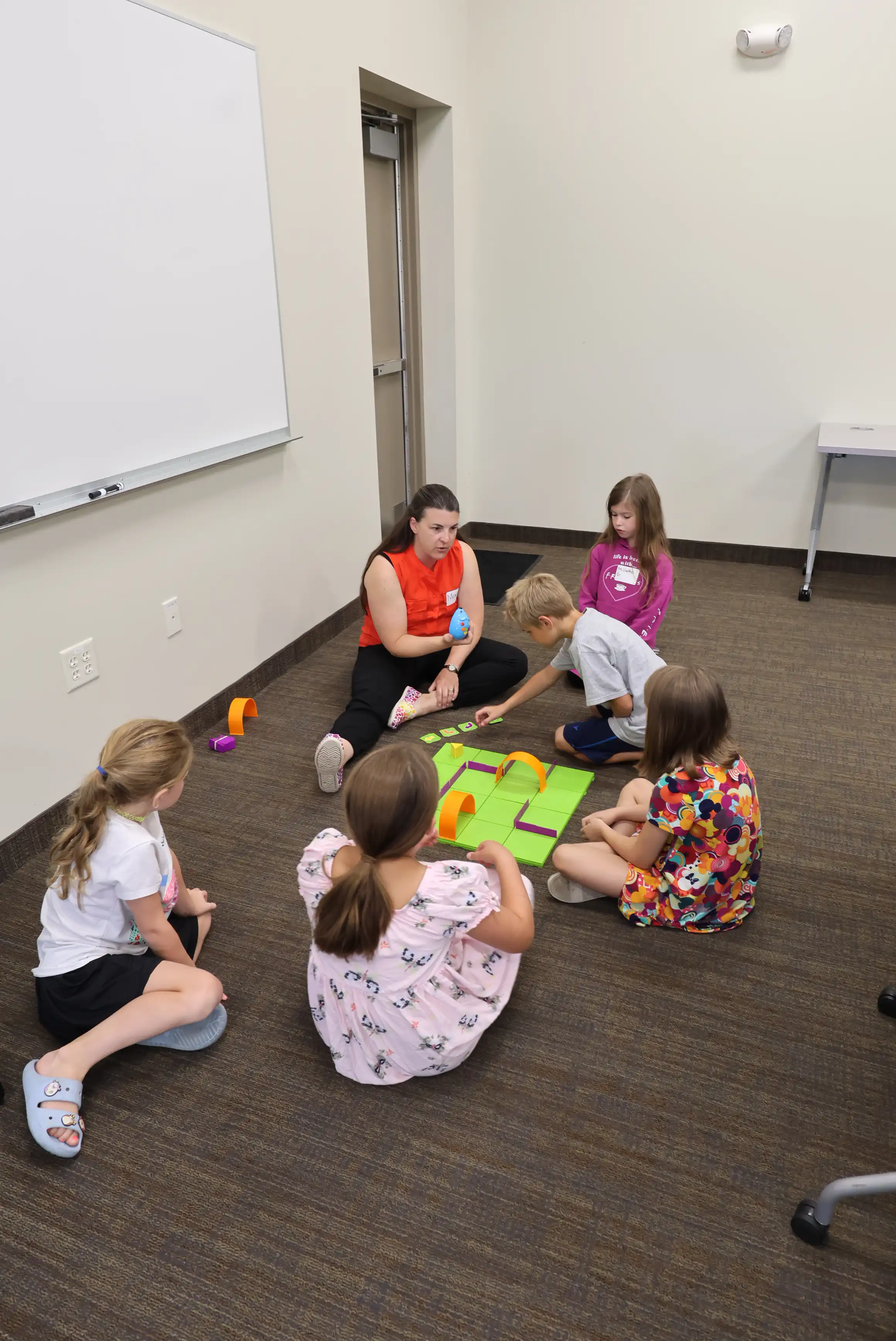 Students working on the floor