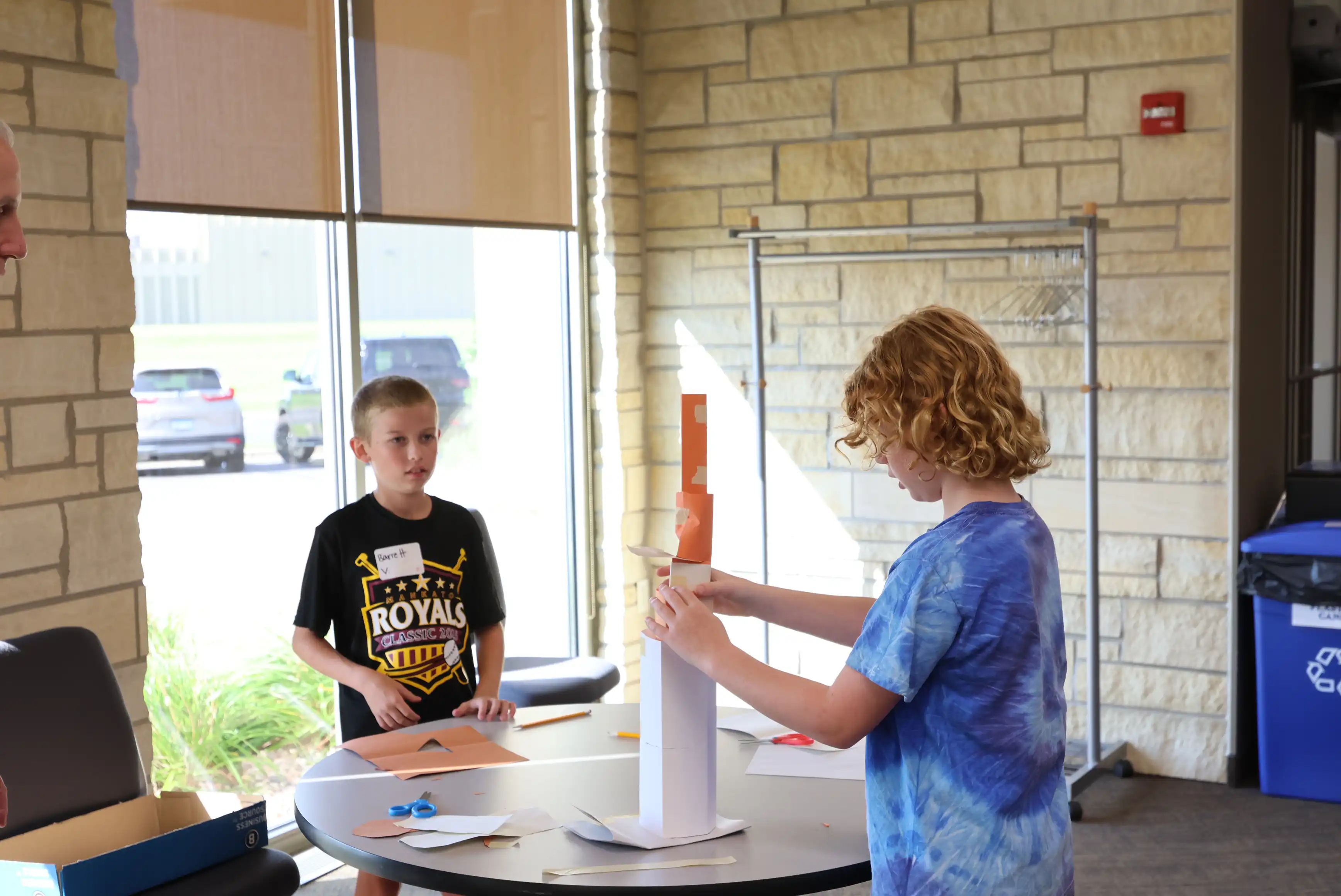 2 students working together to build their project