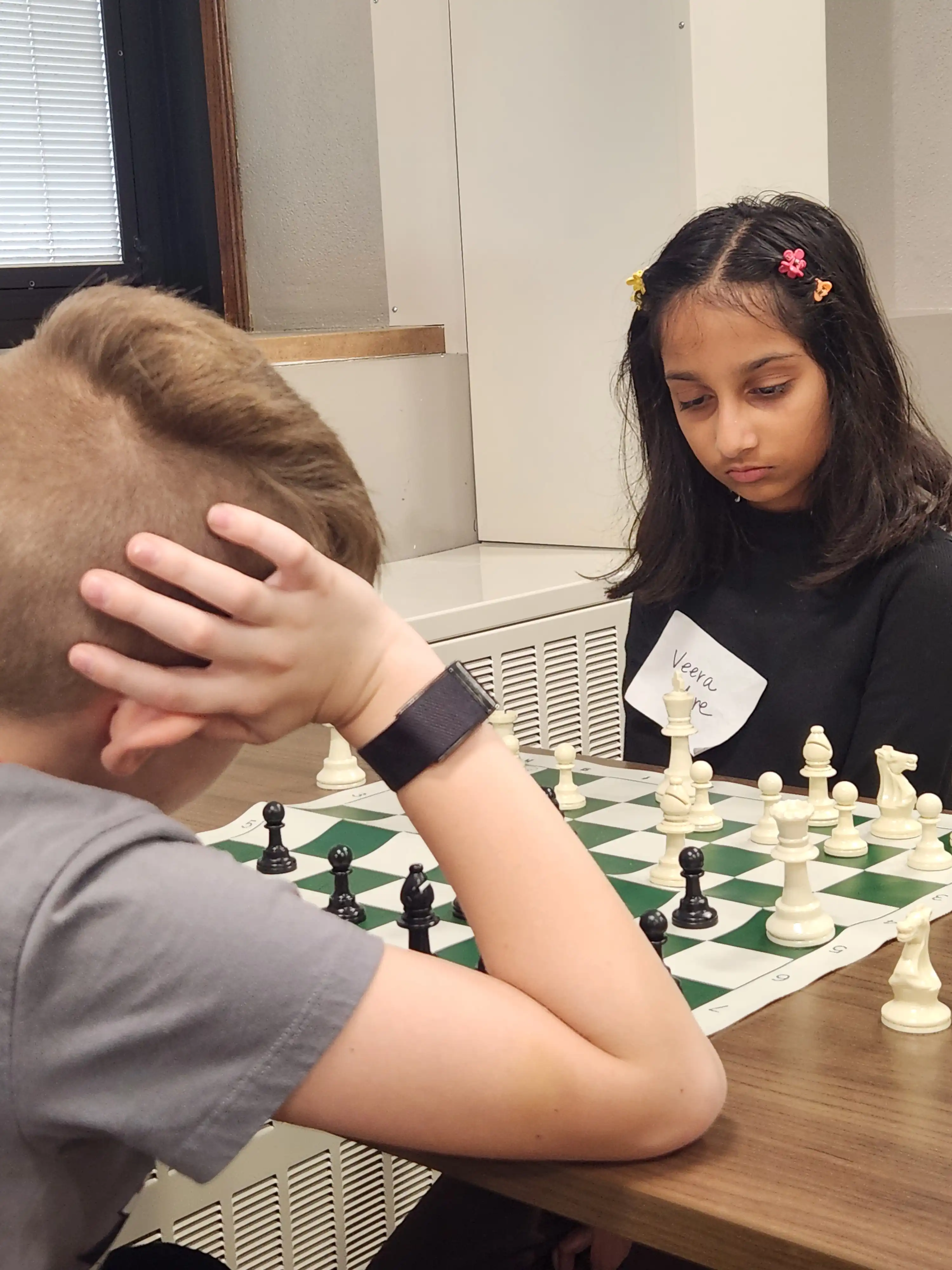 2 students playing chess