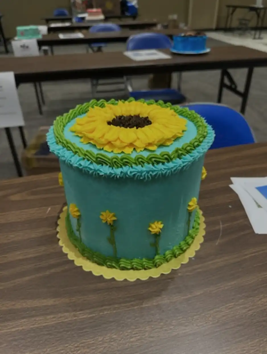 Cake decorated with yellow flowers
