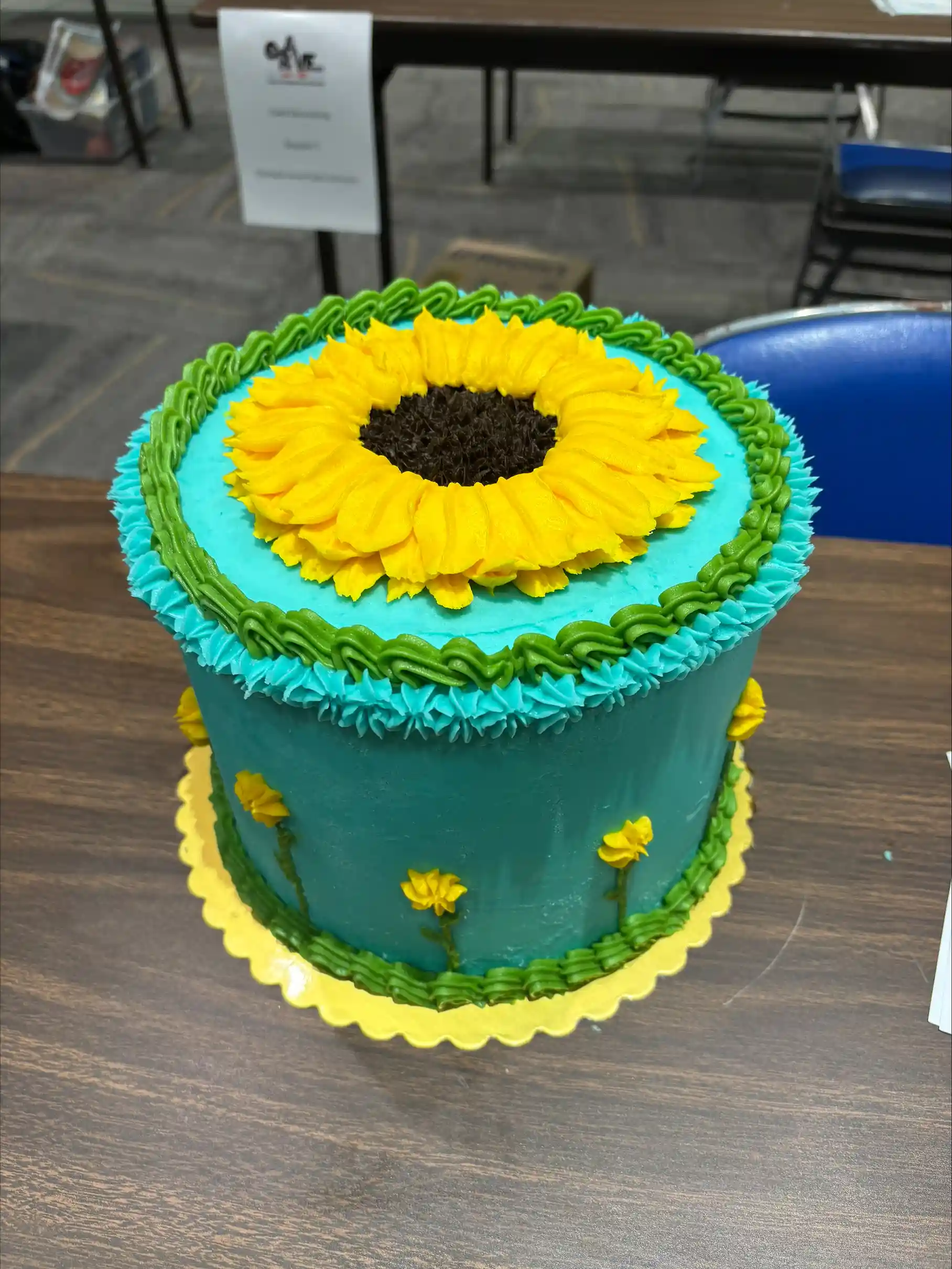 Cake decorated with a yellow flower