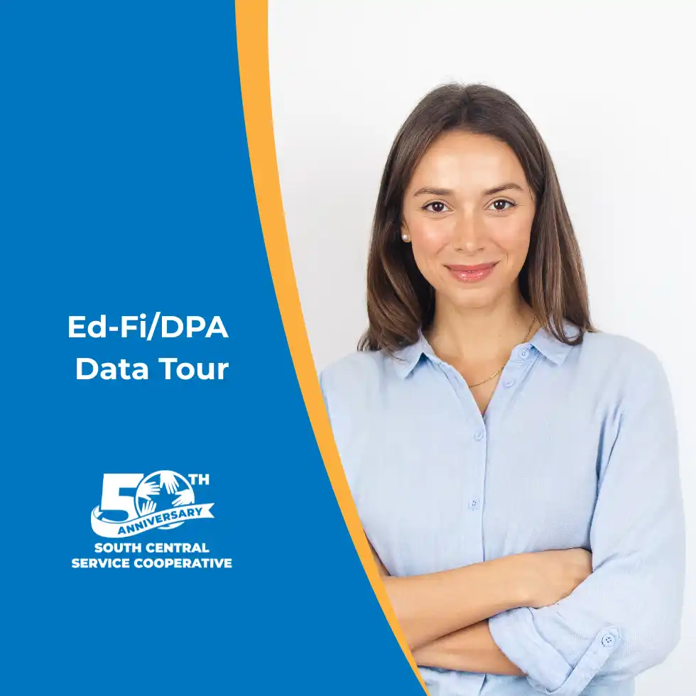 Lady standing with her arms folded in front of her and smiling