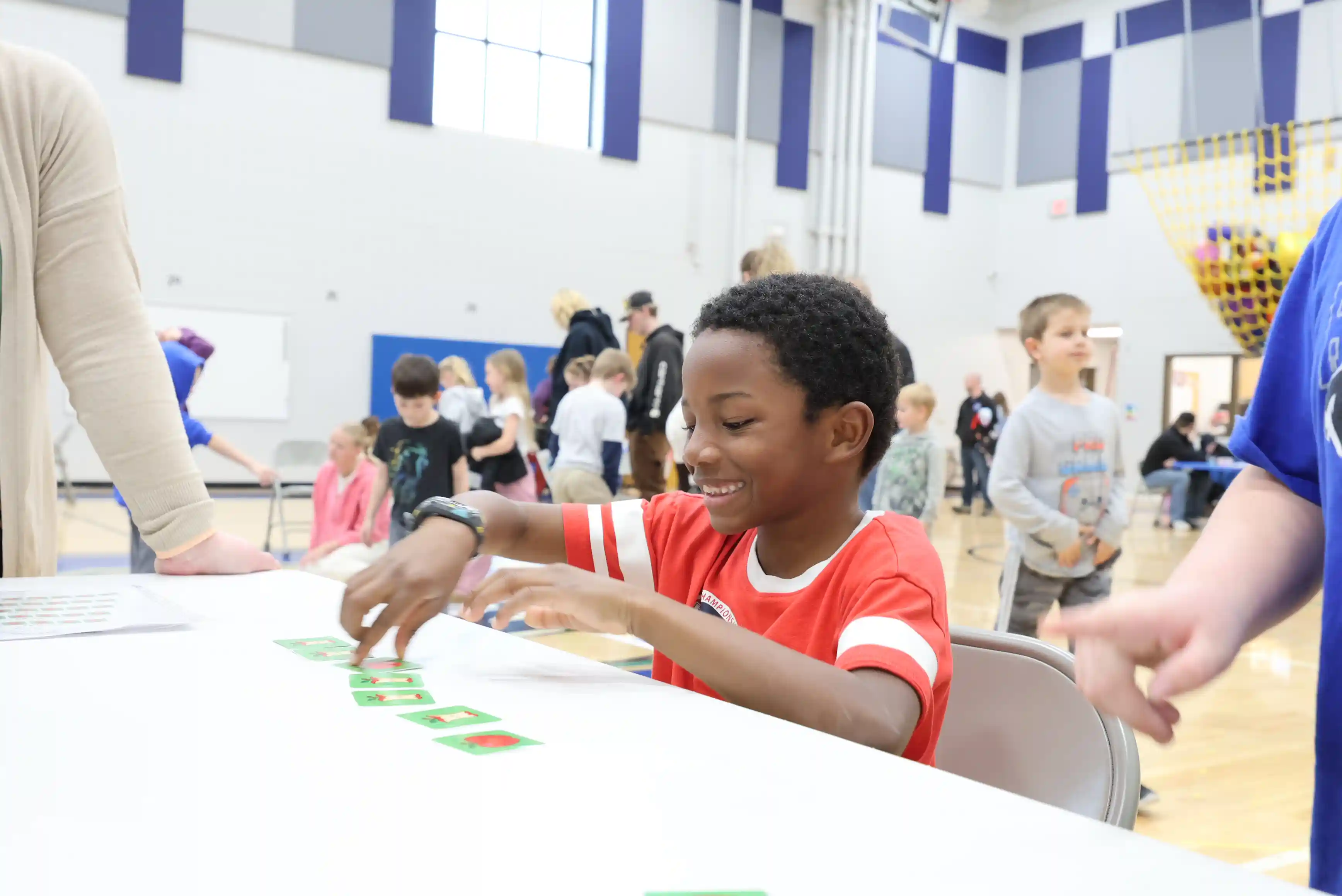 student playing a card game