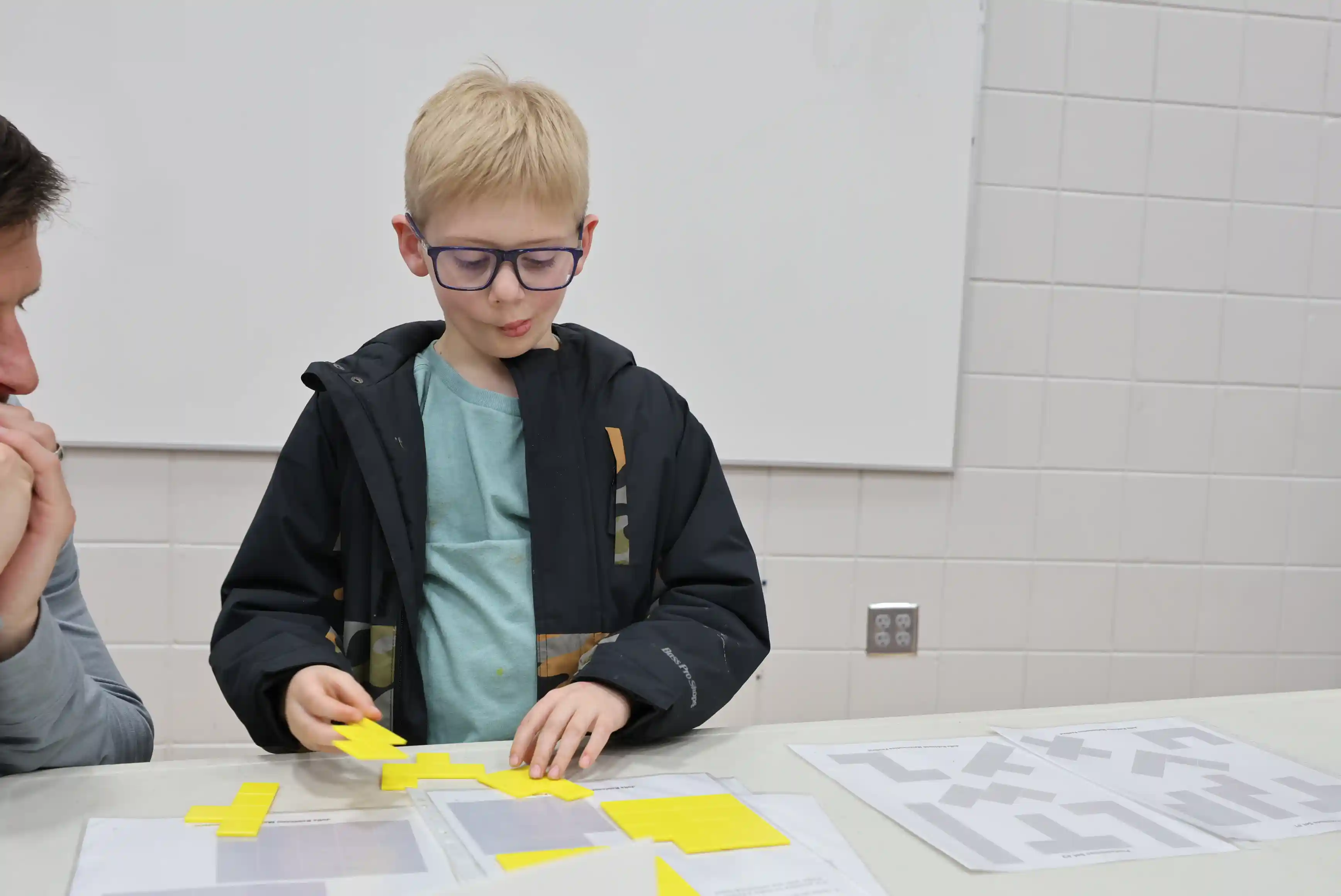 a student working on shapes