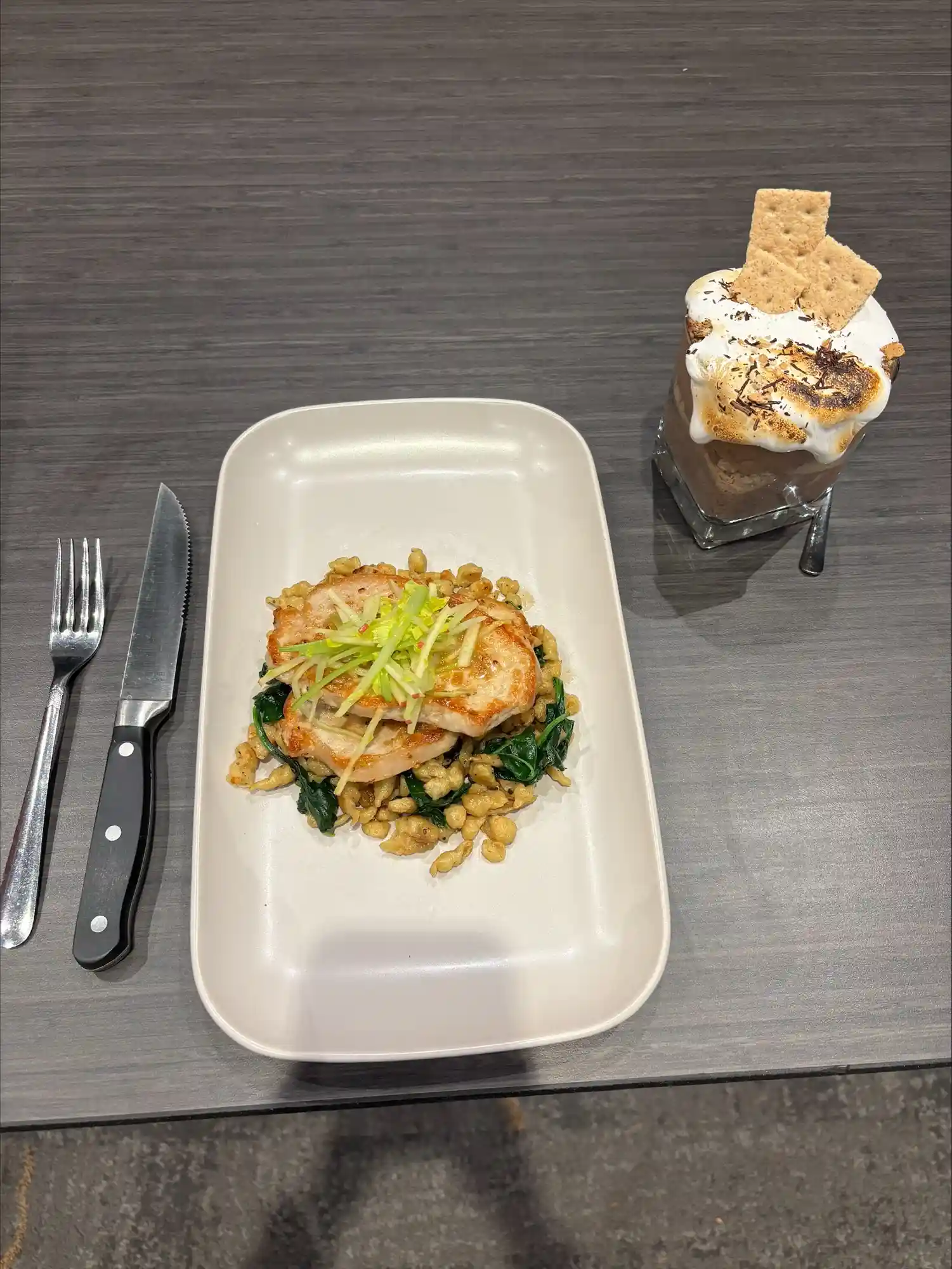 plate with food and a dessert in a dish