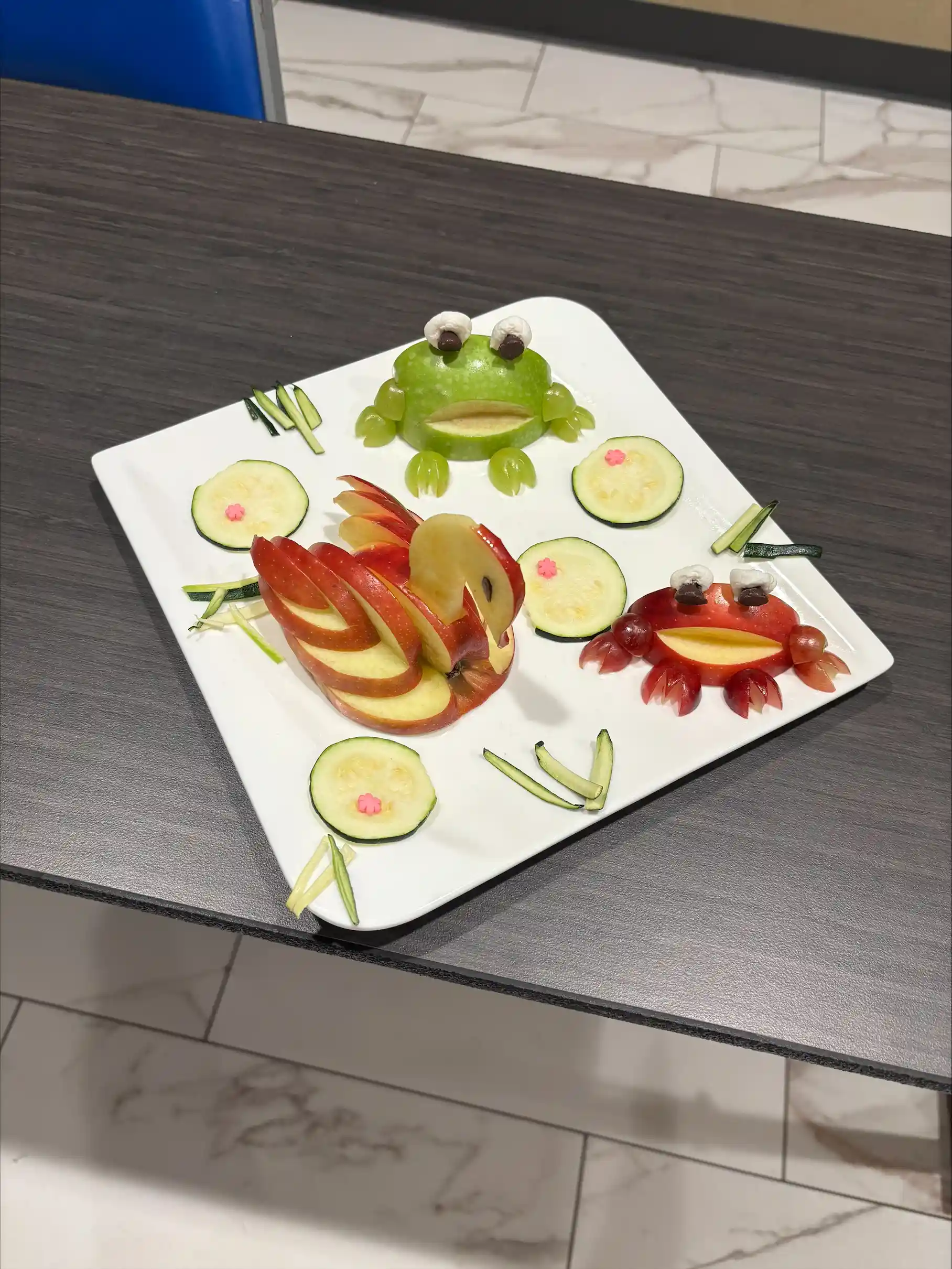 fruit cut into frogs
