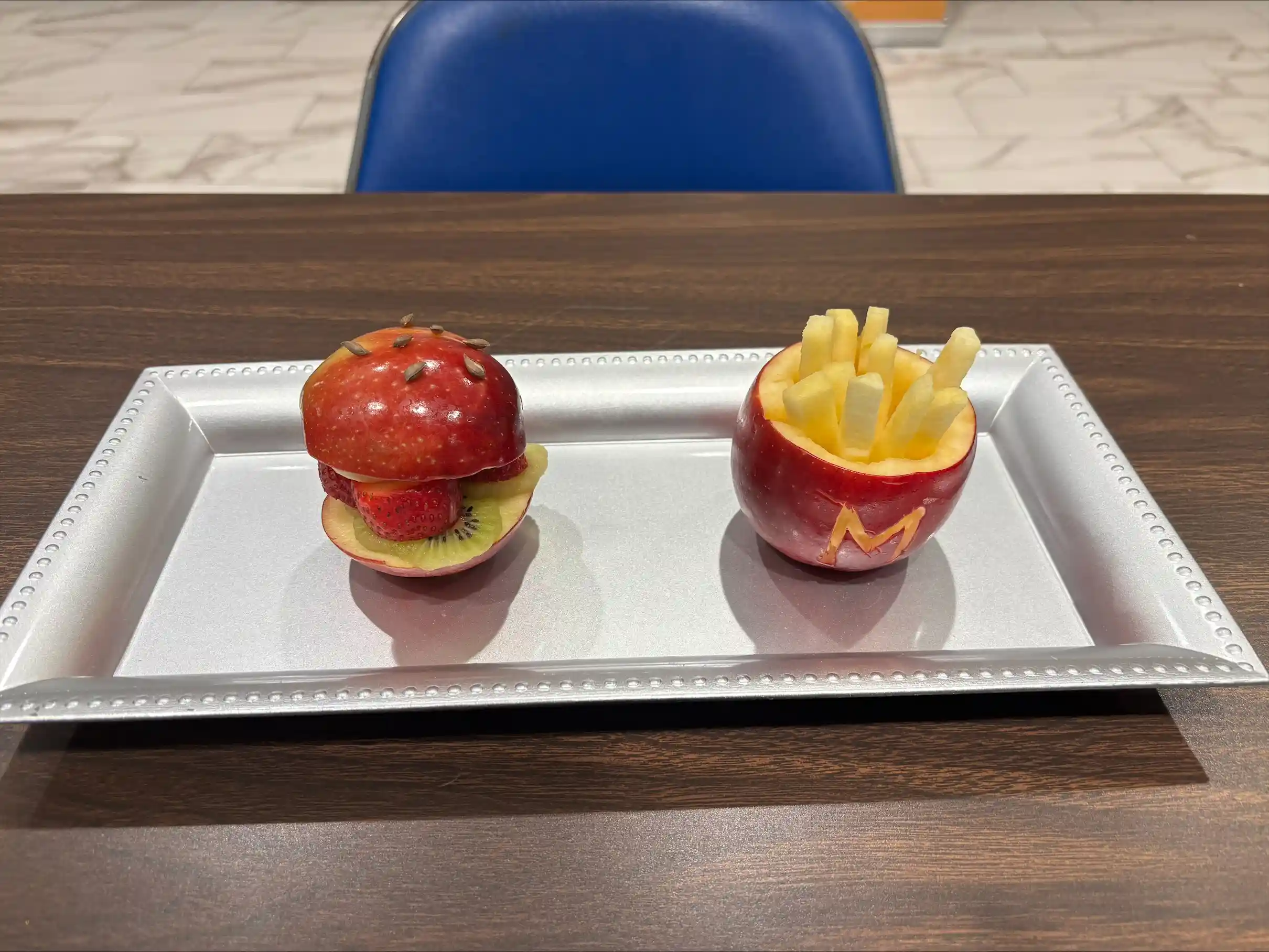 fruit cut to look like a burger and a fries