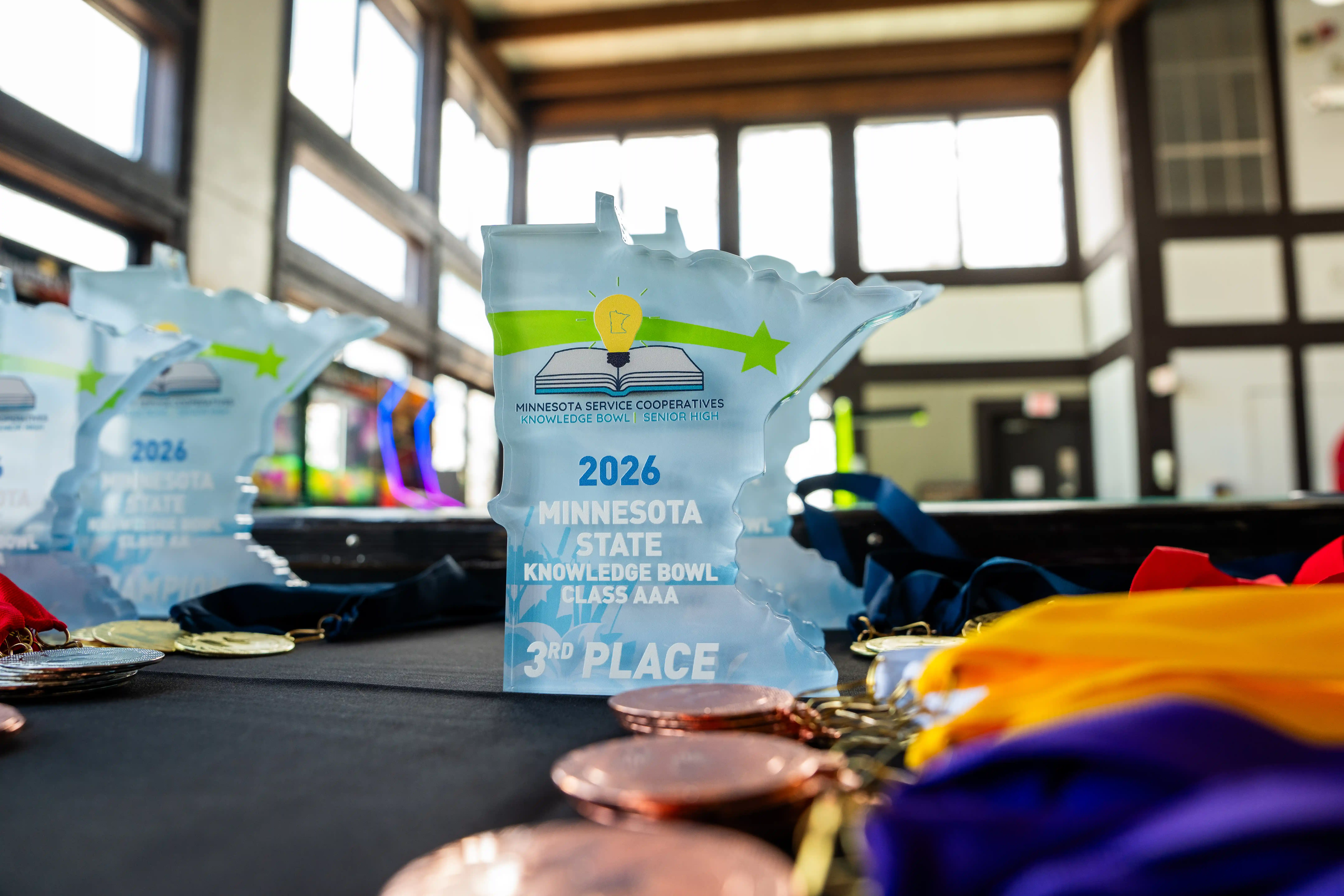 Knowledge Bowl Award in shape of the state of Minnesota