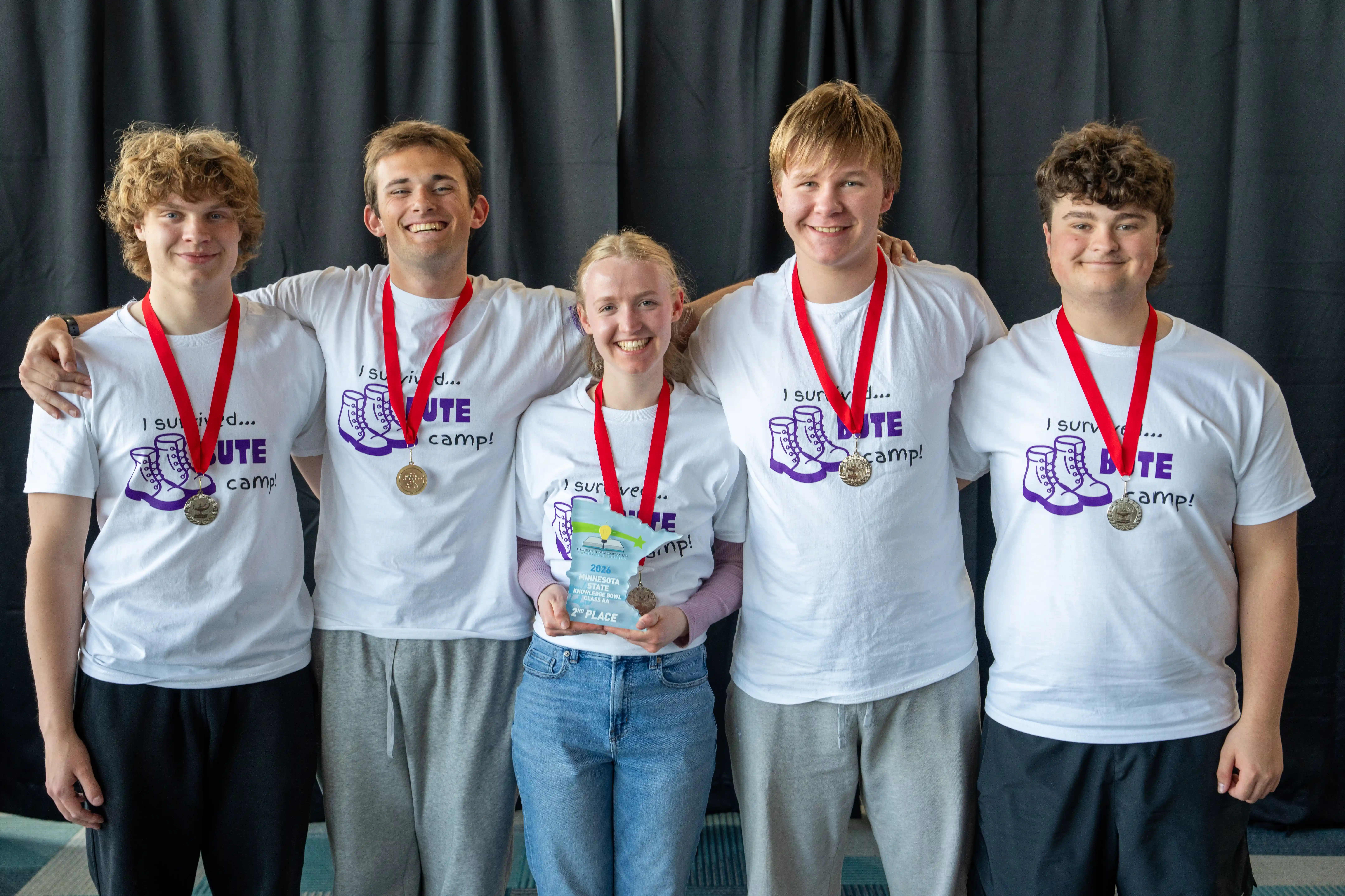 Picture of 5 members of the New Ulm High School Team