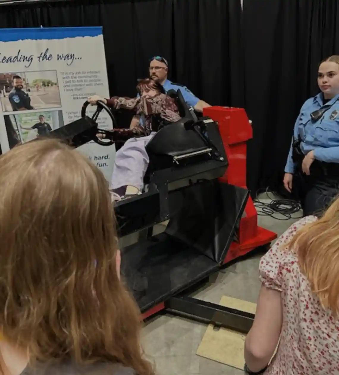 students learning about a career at a booth