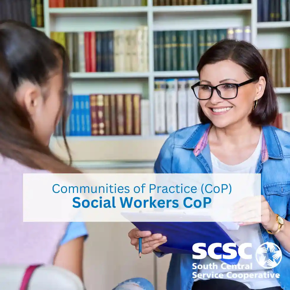 Student and adult talking to each other in chairs.