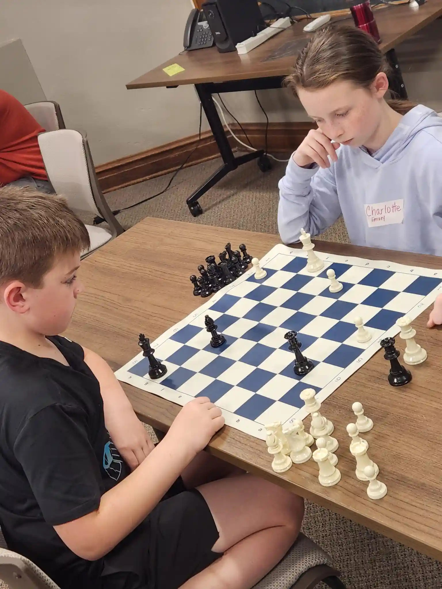 2 students playing chess