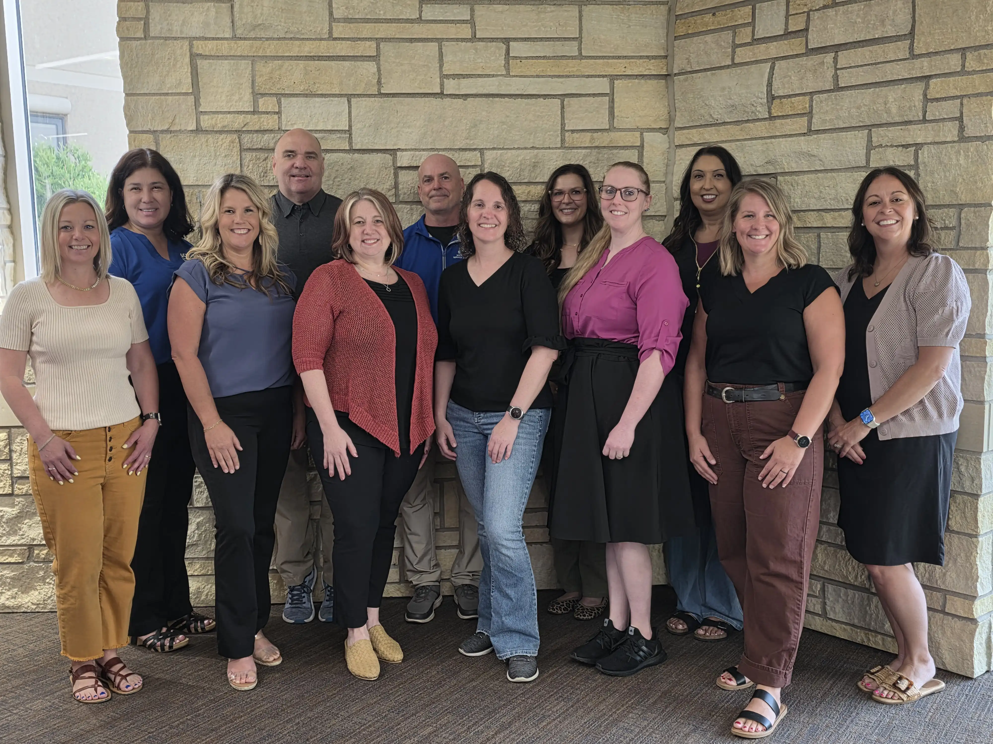 SCSC COMPASS Team standing in a group smiling for a picture