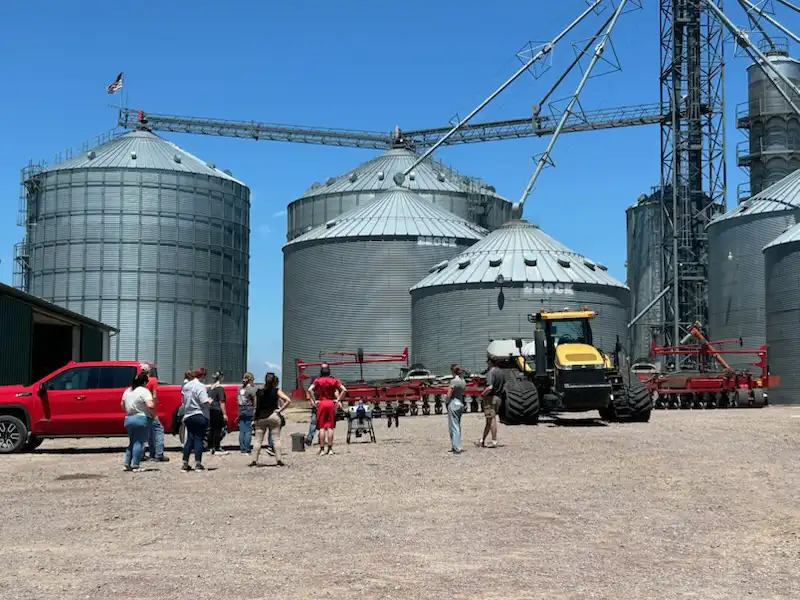 students visiting a farm.