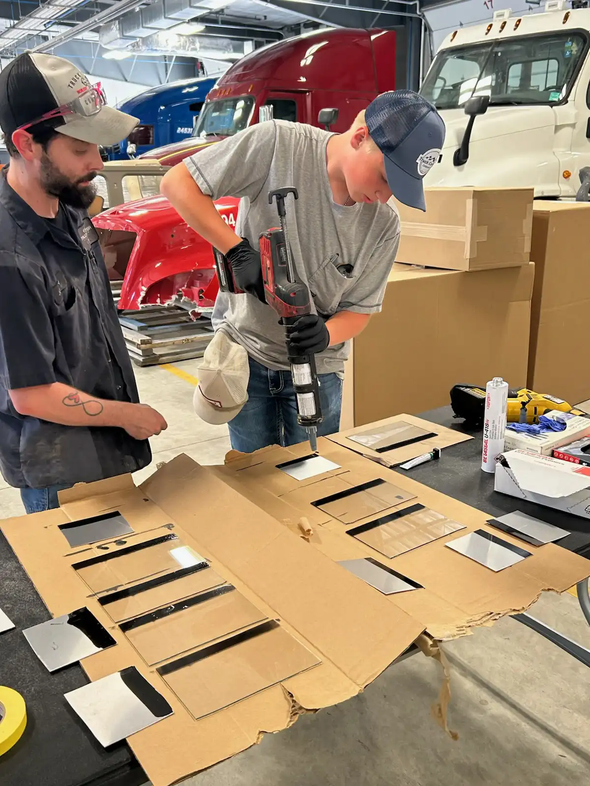students cutting metal