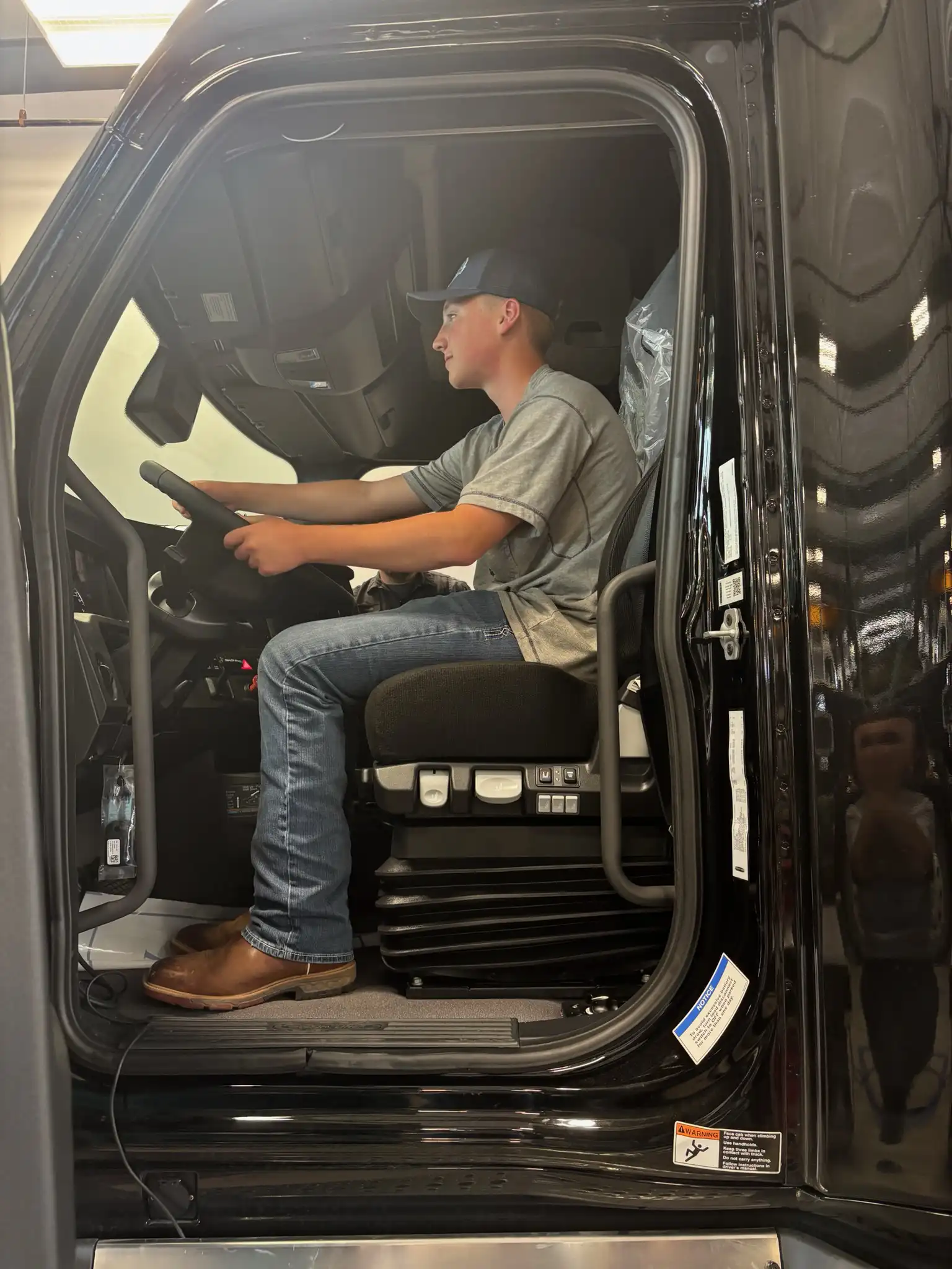 students in a track cab