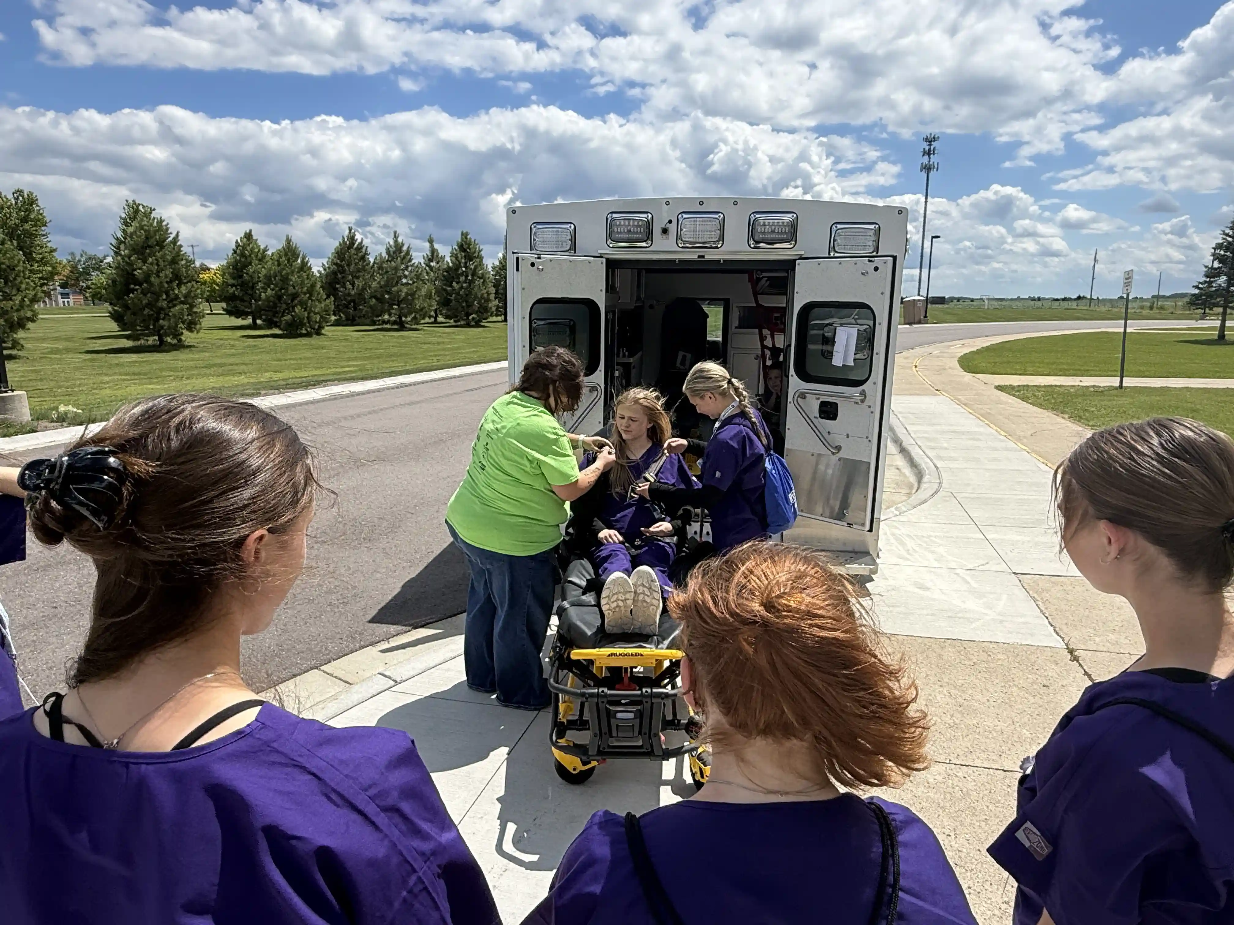 Students by an ambulance