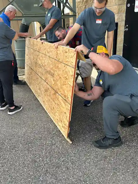 Teachers in woodwork shop