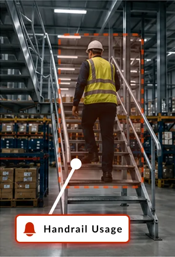 Worker on a metal staircase with a handrail usage detection card
