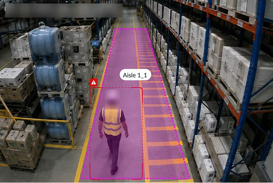 Warehouse aisle camera view with a drawn zone and a person inside it
