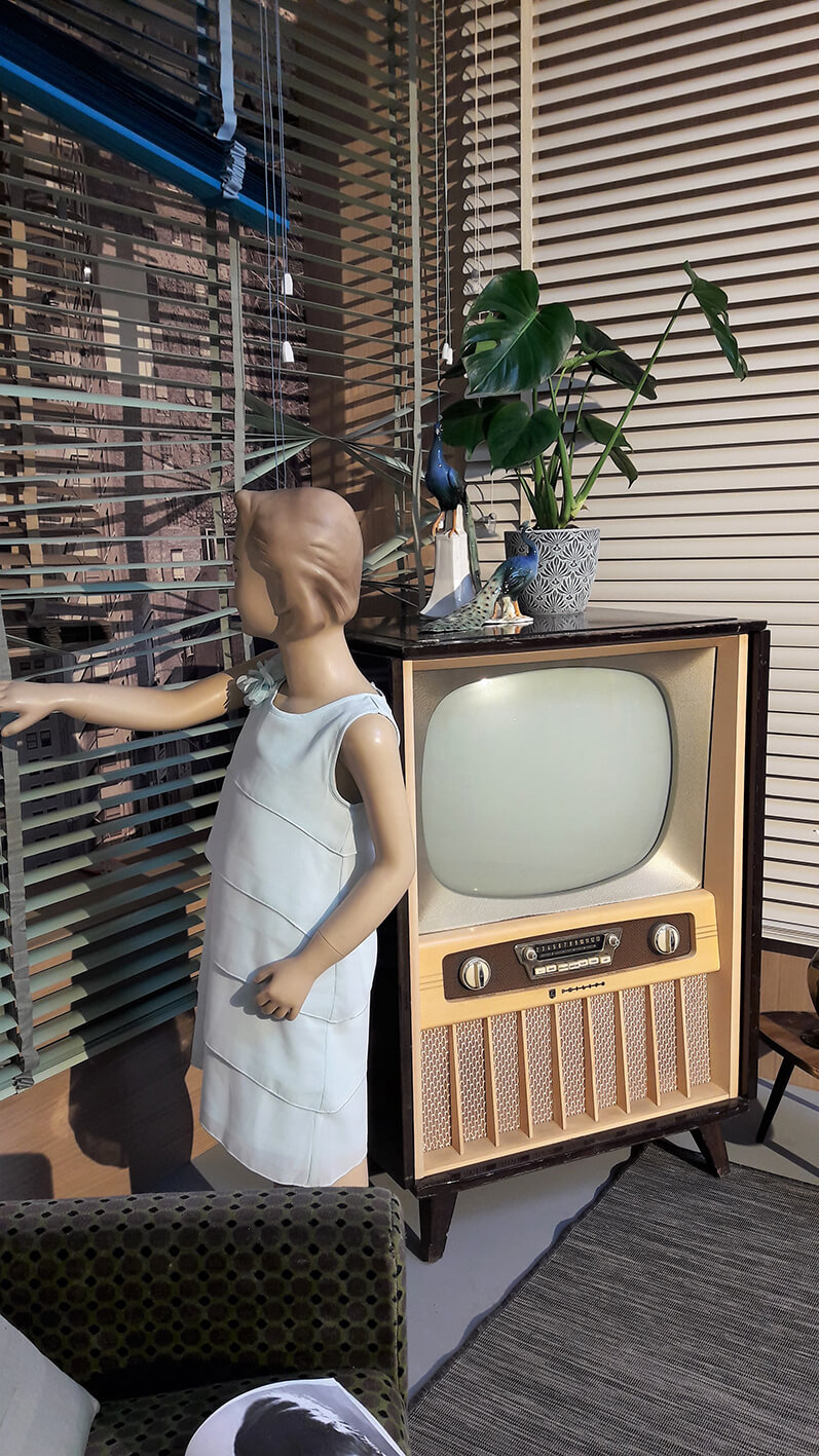 Street art featuring a mannequin and an old tv.