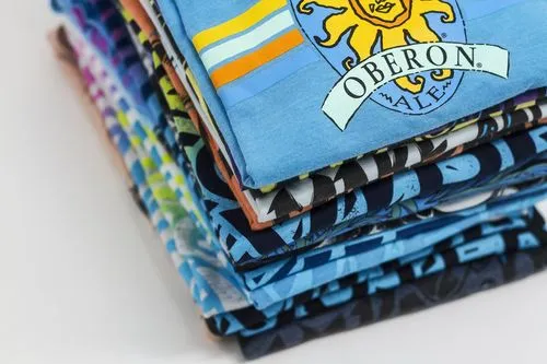 automated screen printing machine printing multiple shirts simultaneously, close up