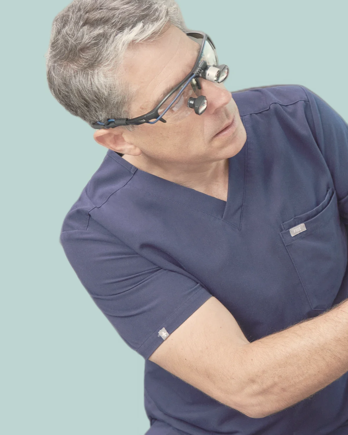 Dr. Thomas Buonassisi, MD, FRCSC, wearing surgical loupes