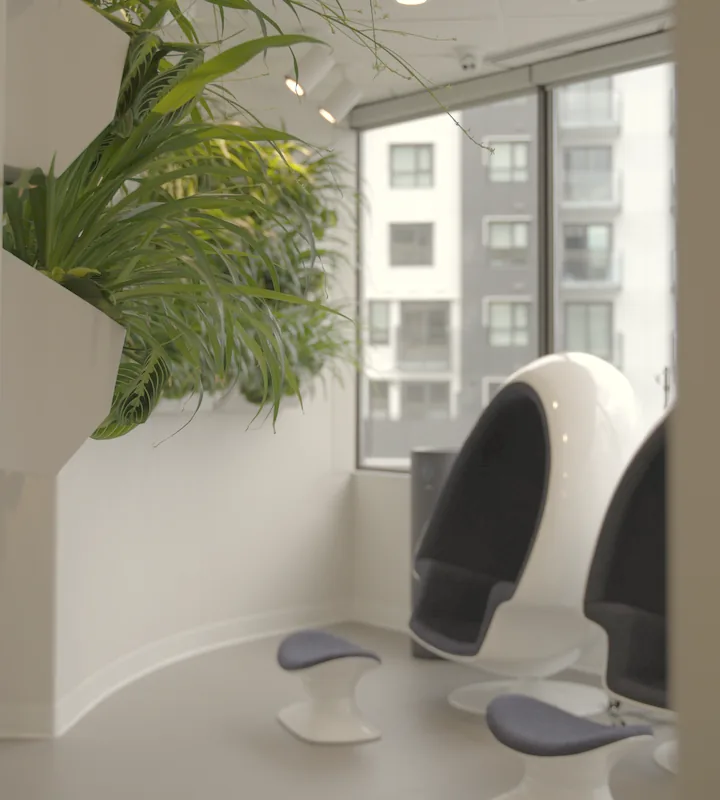 Pod chairs by the window in the 8 West IV lounge