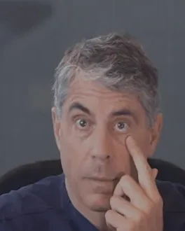 Dr. Buonassisi pointing to the skin under his eye