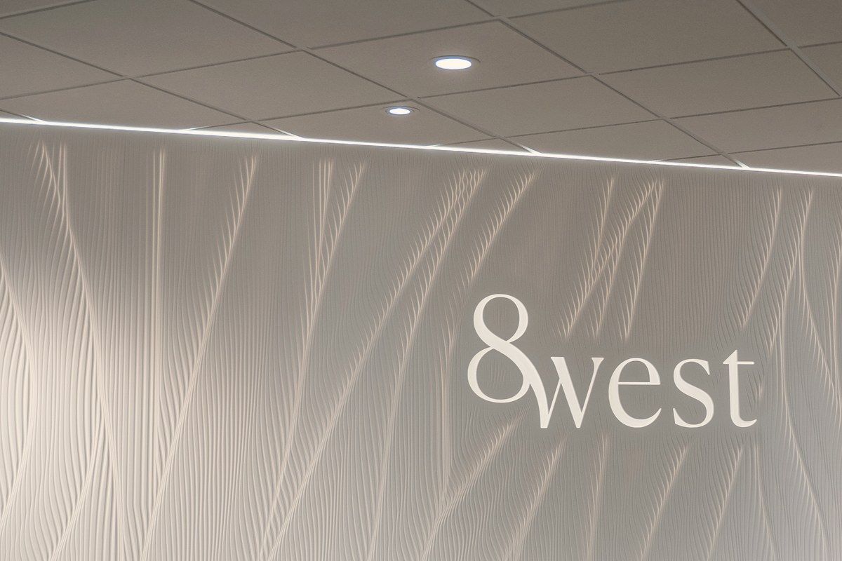 8 West Clinic reception in North Vancouver with the 8 West sign