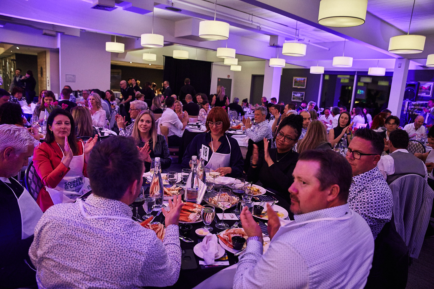 a group of people at a fundraising dinner