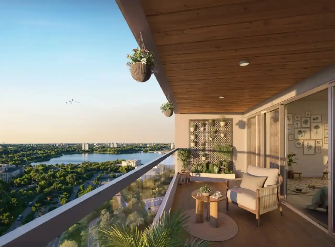 Concorde Eleve balcony: plants, seating, lake view.