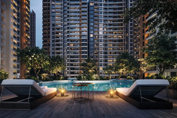 Poolside seating area at Prestige Evergreen