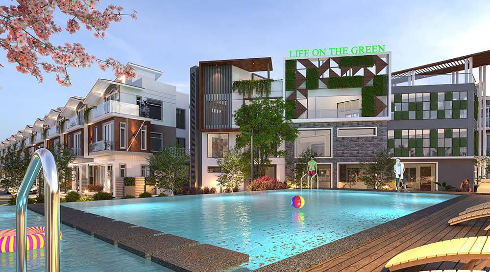 Swimming pool view at Sowparnika Life On The Green villas