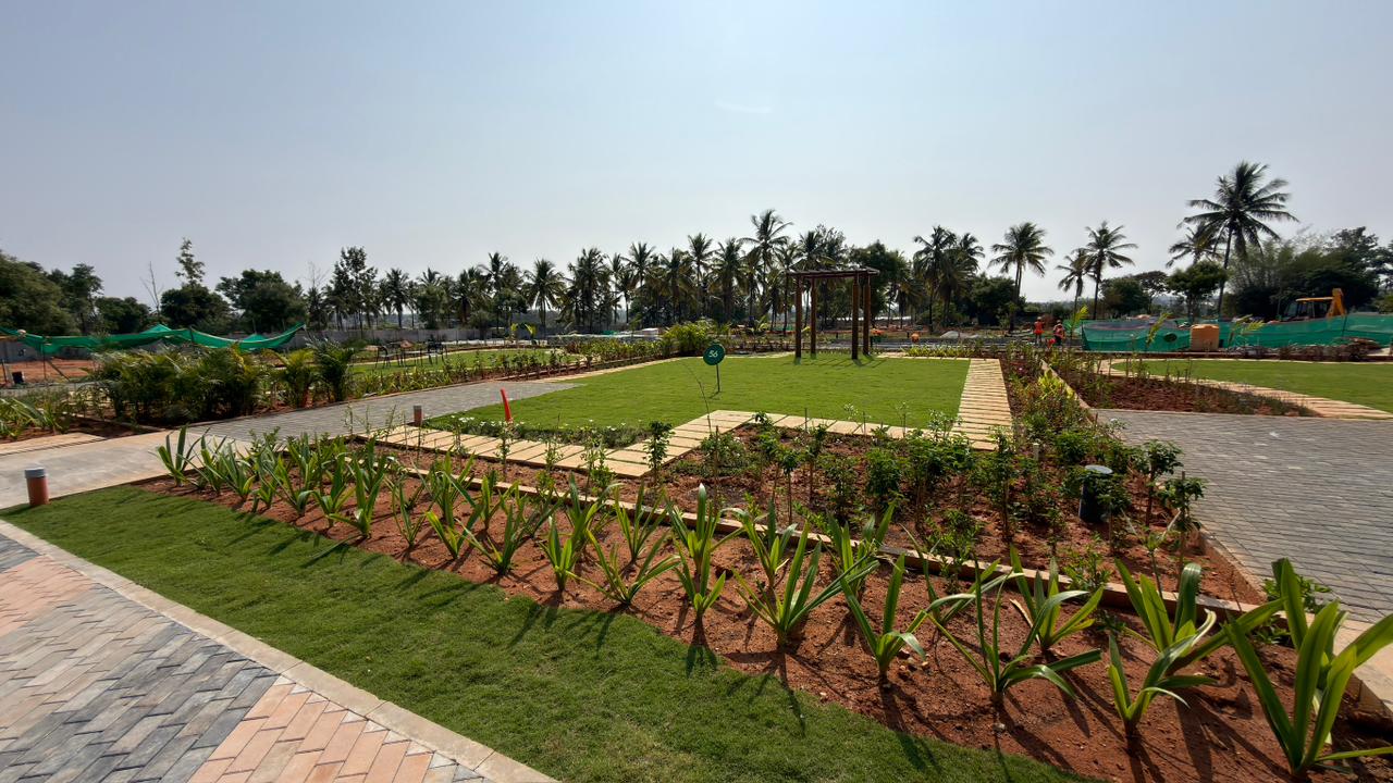 Open lawn and pavilion at Fortius Good Earth Devanahalli