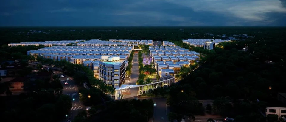 Casagrand Vybe aerial night view with lit arrival court and clubhouse, Gagan Pahad Hyderabad, artist impression