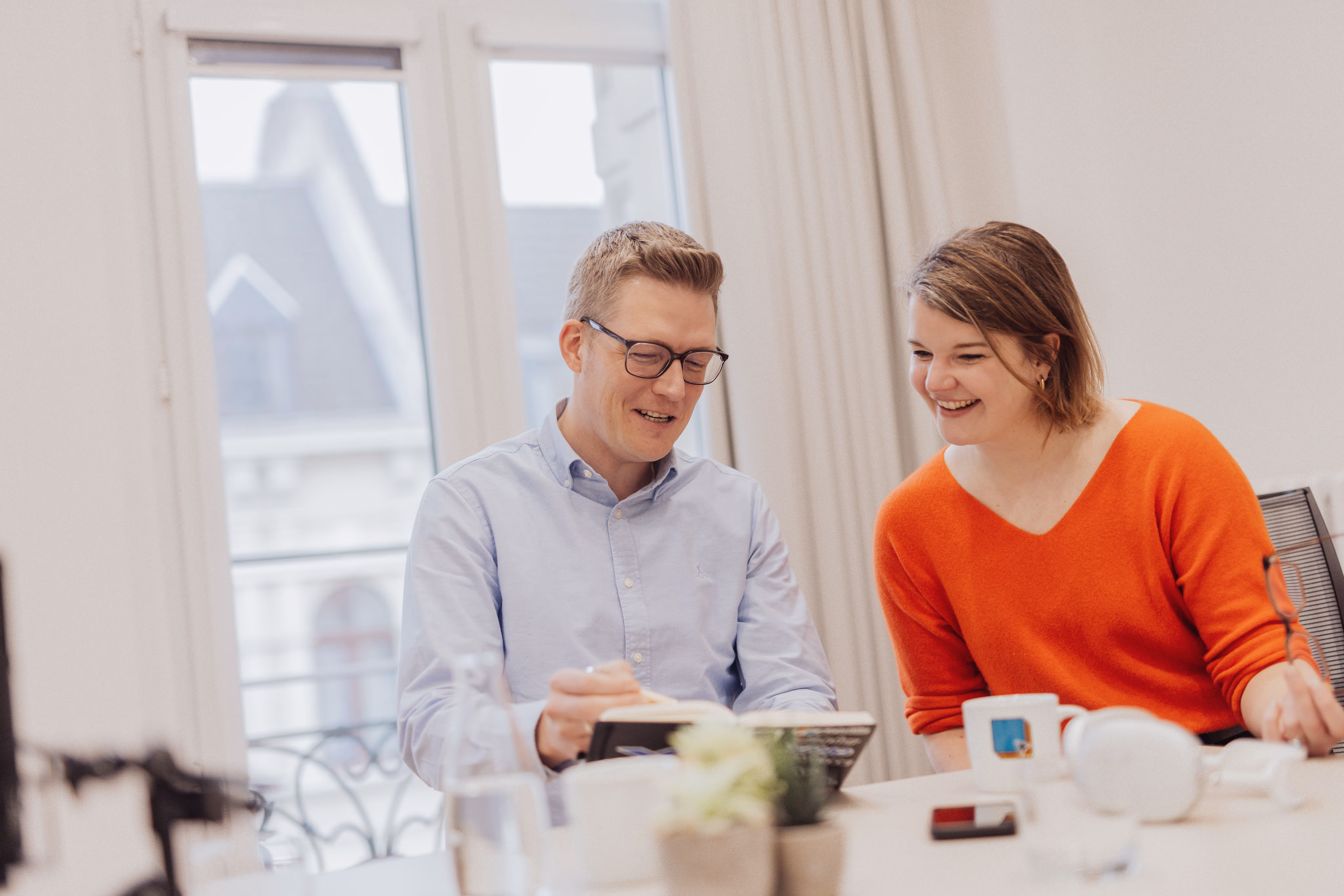 lilith and till in a sales discussion